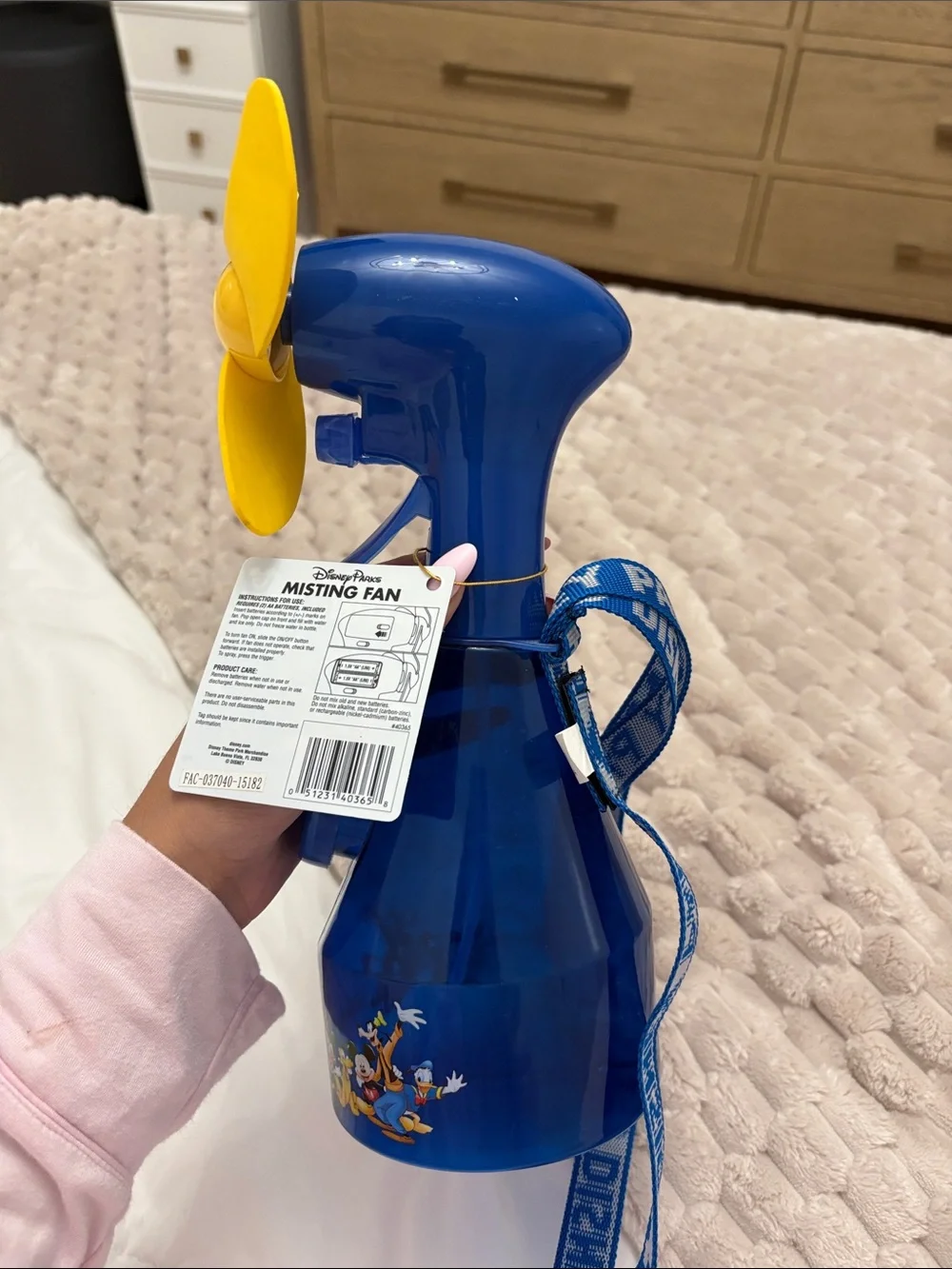 Discontinued Disney Blue Handheld Fan with Yellow Blades and Character Strap